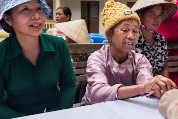 Women in Vietnam undergo medical tests in a healthcare center